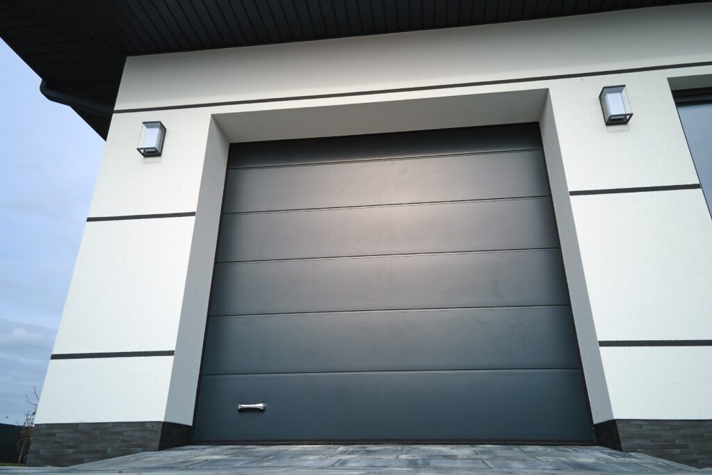 Fortify Services technician installing smart garage door opener in Canadian residential garage
