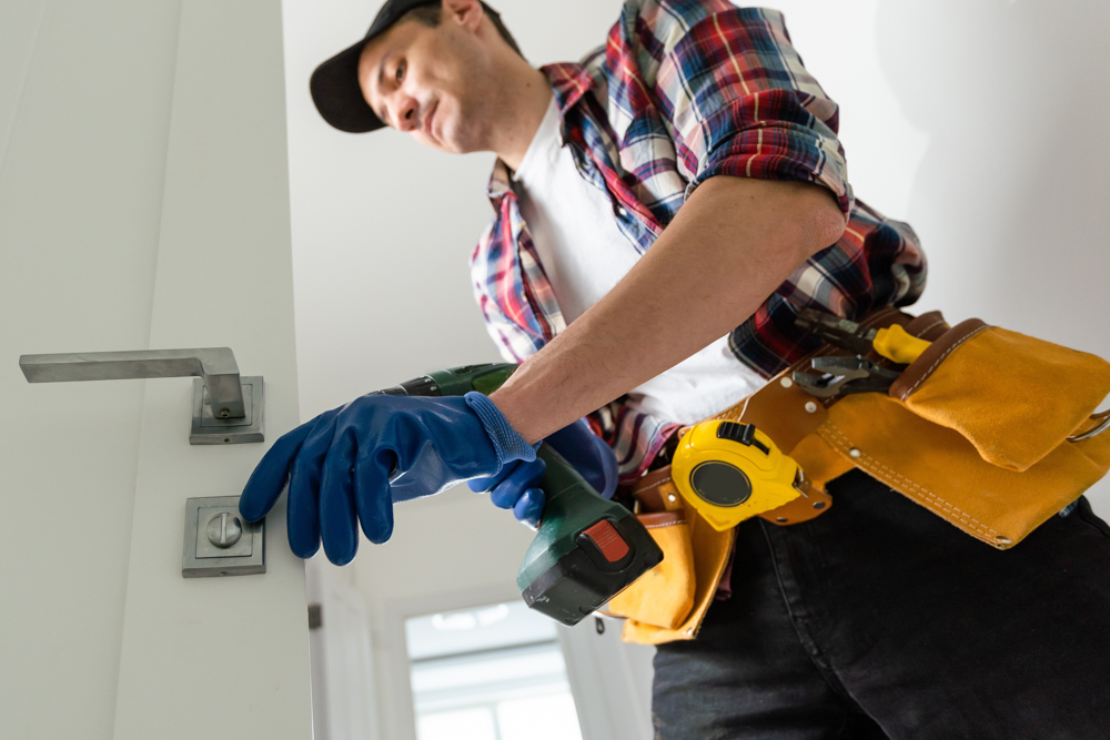 Lock maintenance on residential front door in Canadian home
