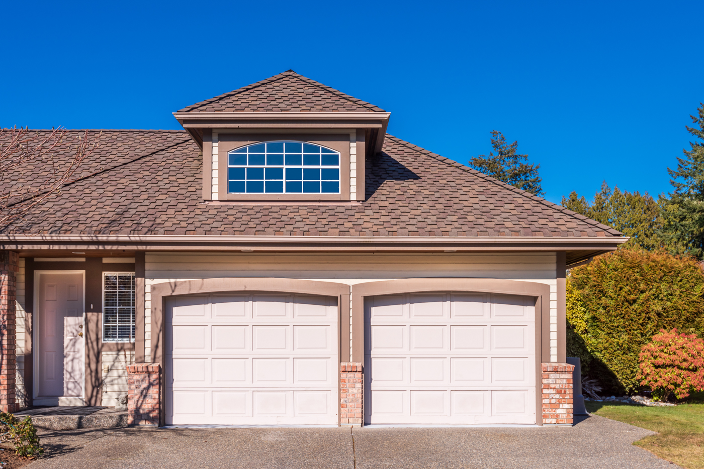 Double residential garage doors on Canadian home