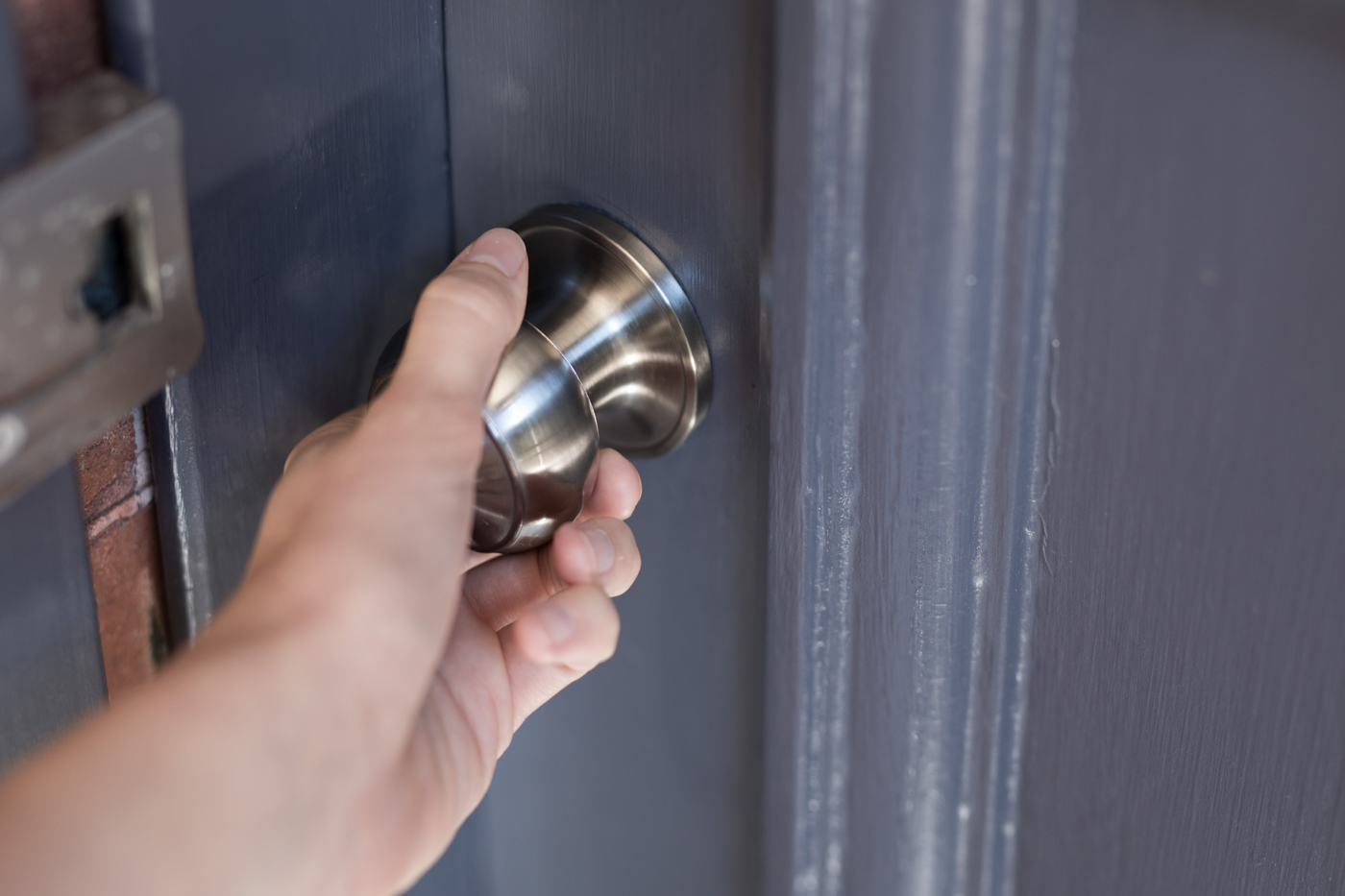 Hand turning front door knob with secure lock system