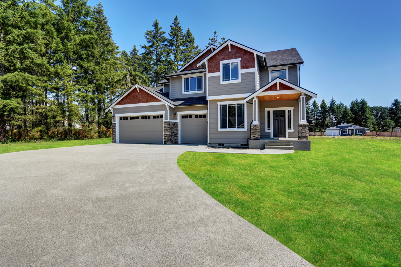 Modern residential garage door on Canadian home driveway