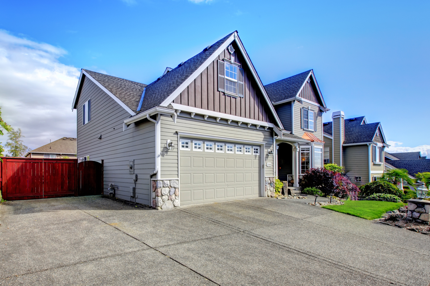 Modern residential garage door with panel design in Canadian home