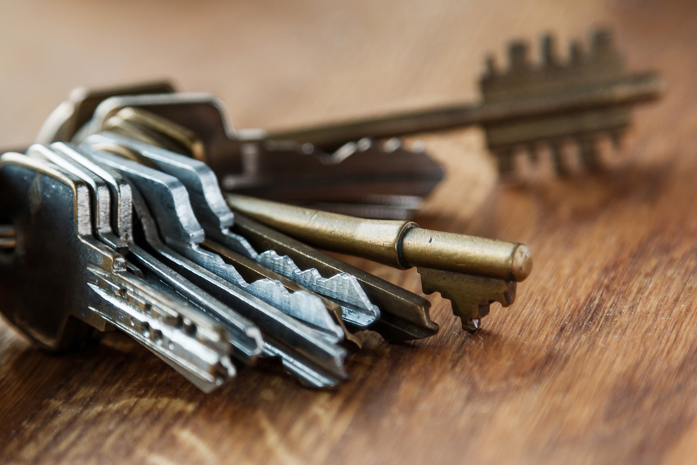 Locksmith installing deadbolt lock on home door