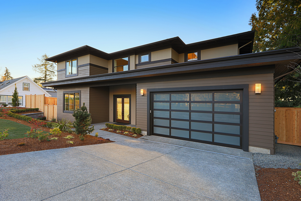 Insulated overhead garage door in commercial bay