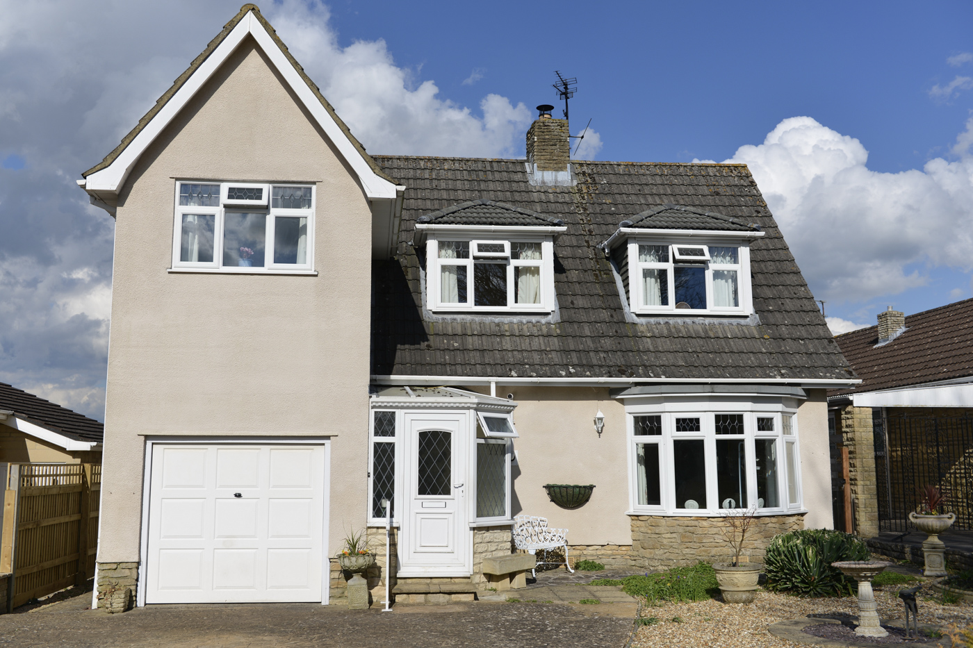 Residential garage with white door