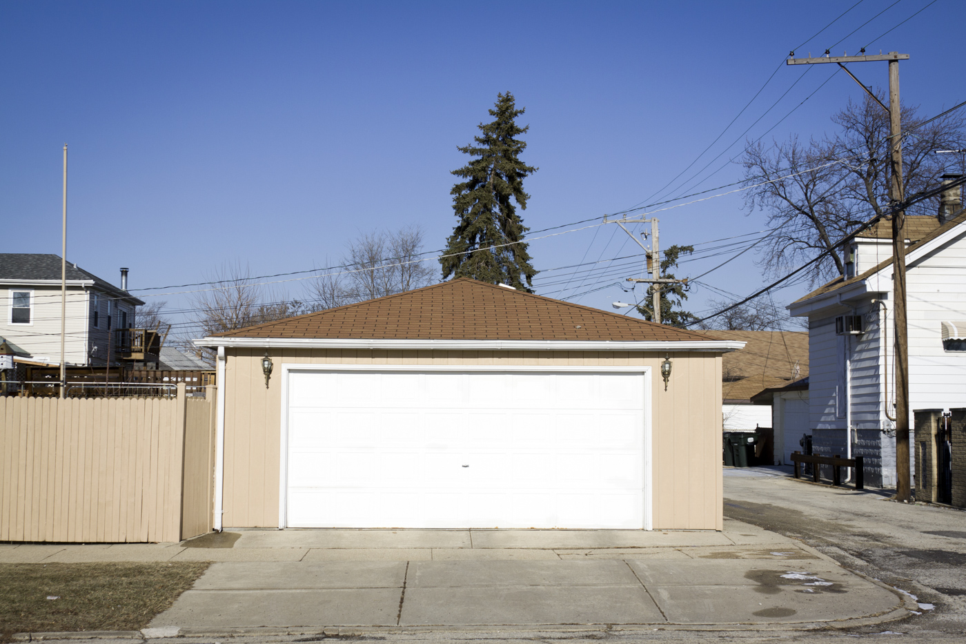 Residential garage with white door