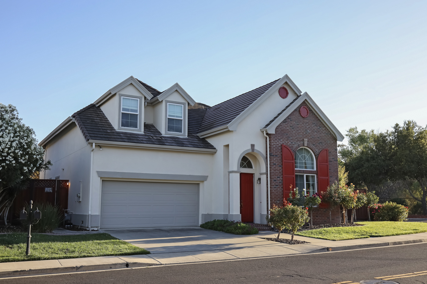 Modern residential home with steel garage door