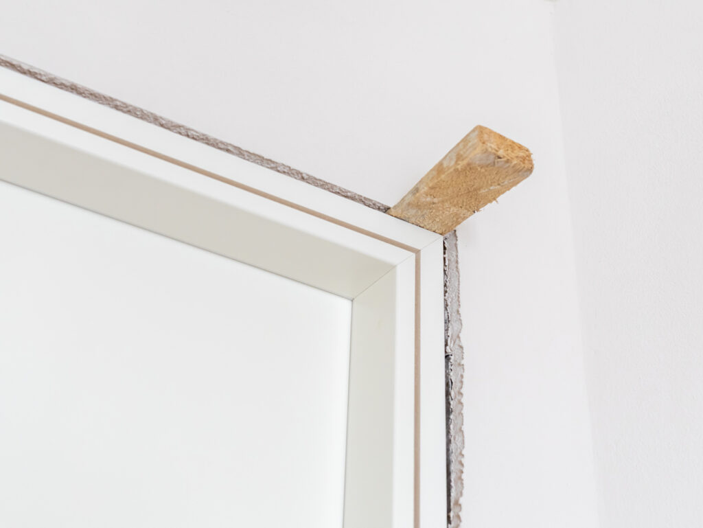 Pocket door frame installation in home
