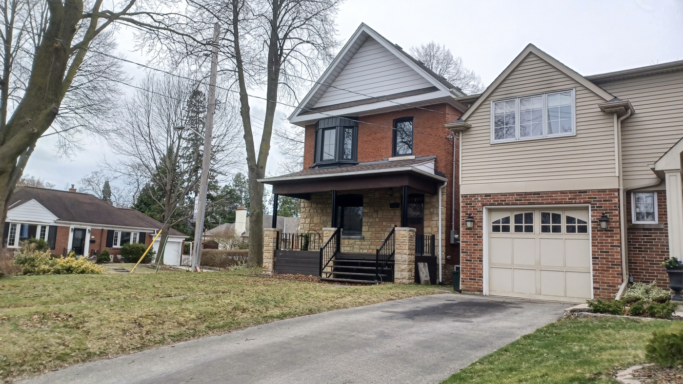 Residential garage door on Canadian home driveway