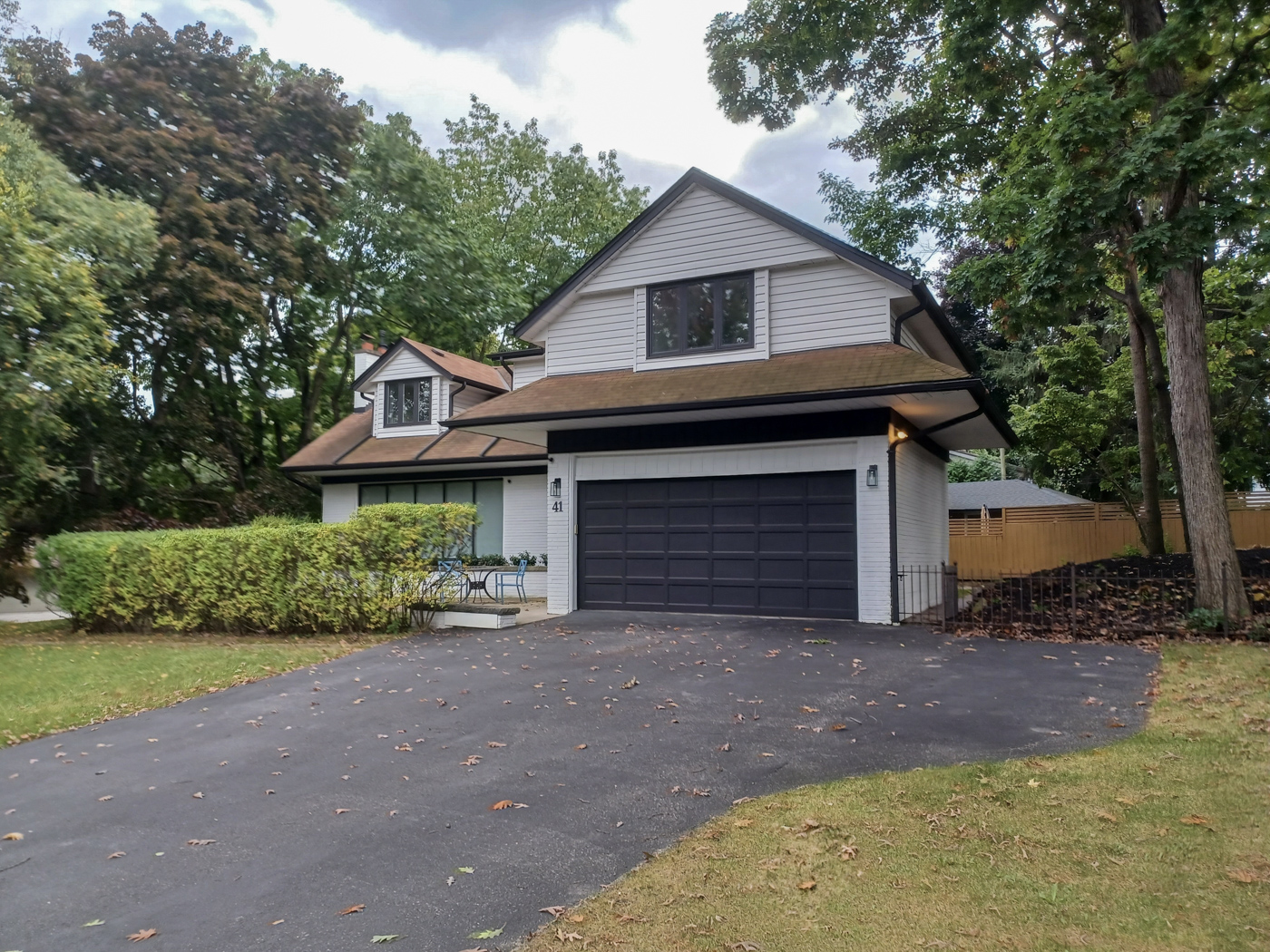 Technician installing residential garage door