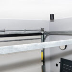 Garage door opener repair track and spring