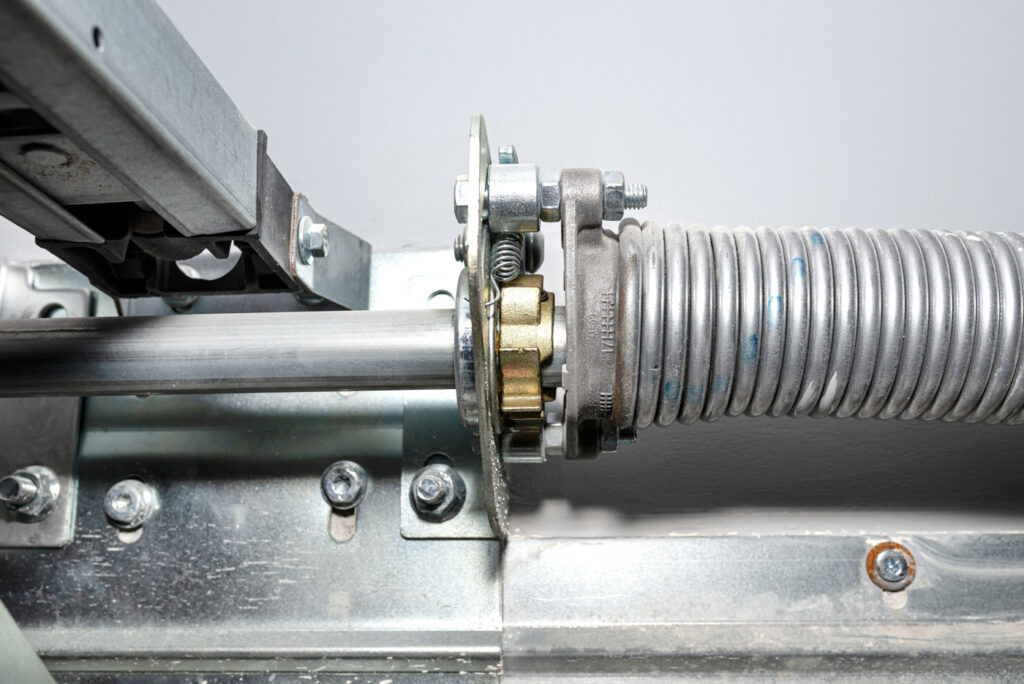 Torsion spring garage door repair setting