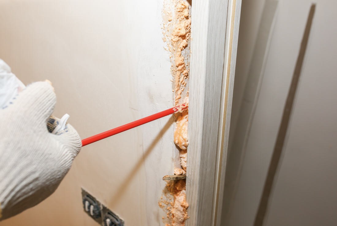 Window installation foam sealing in Canadian home