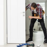 Door repair technician in Canadian home