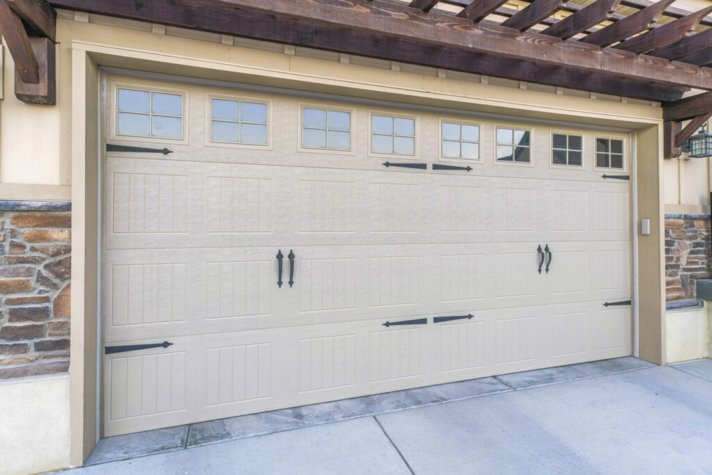 New garage door with windows on Canadian home