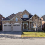 Residential home with two garage doors