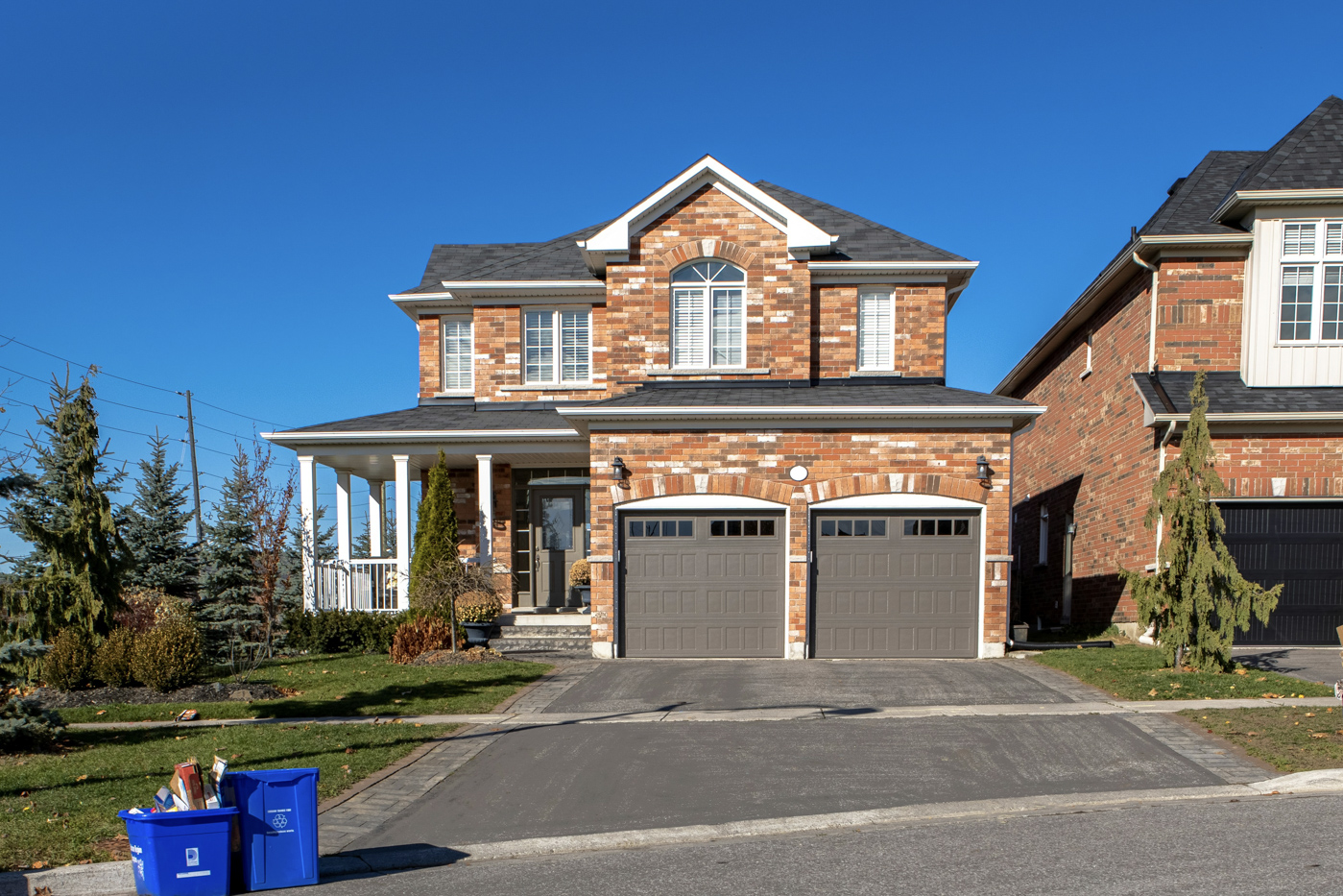 Luxury garage door with windows on Canadian home