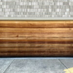Modern wood garage door on Canadian home driveway