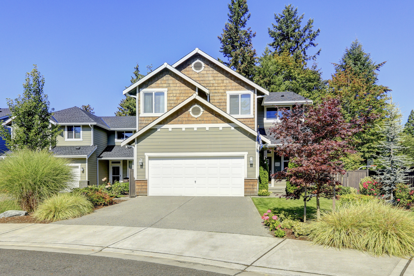 Residential garage door on Canadian home driveway