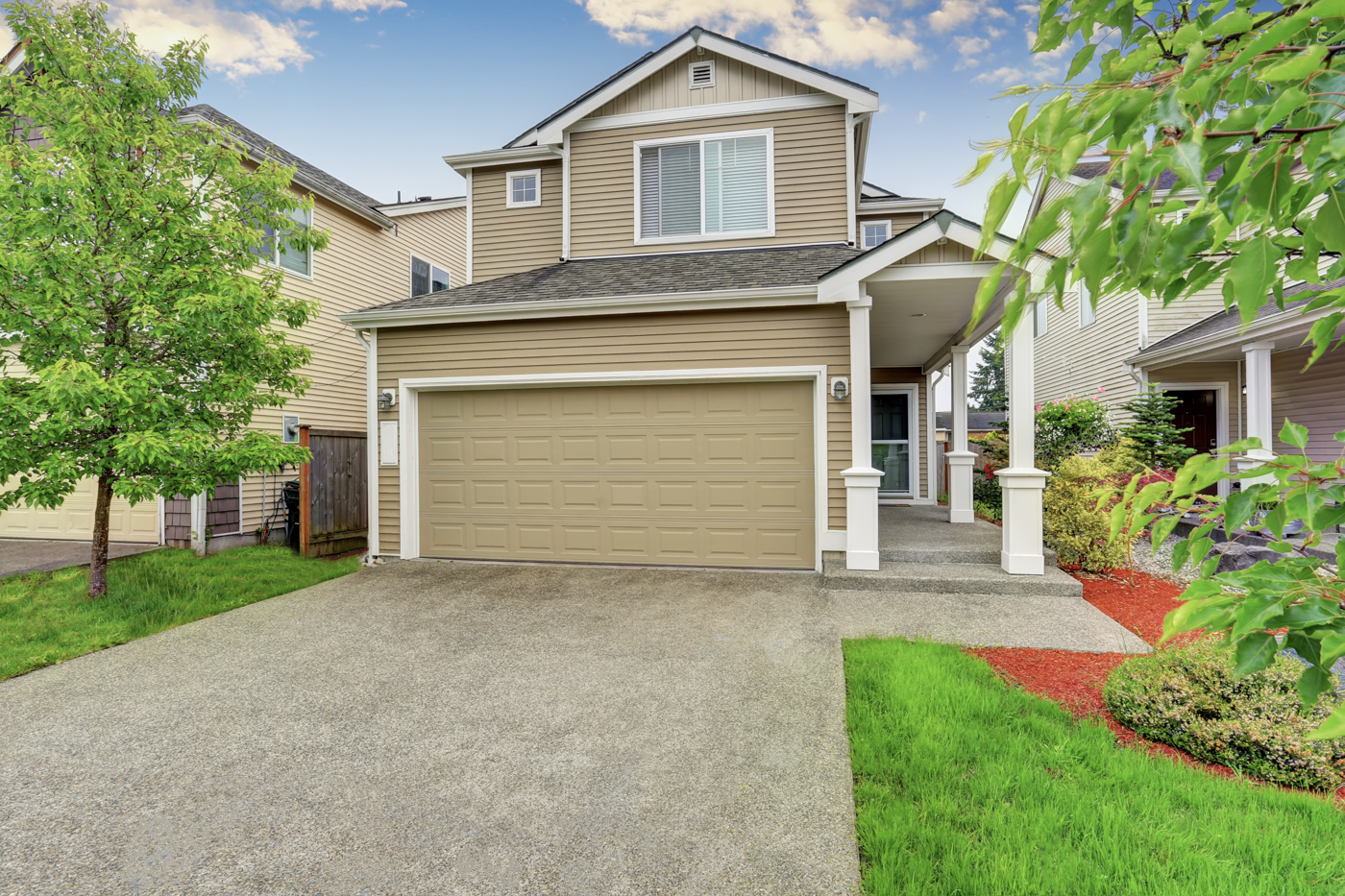 Residential garage door repair home exterior