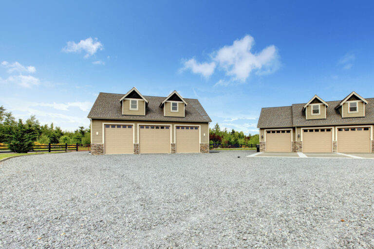 Contemporary Ontario home with double garage doors and manicured front yard