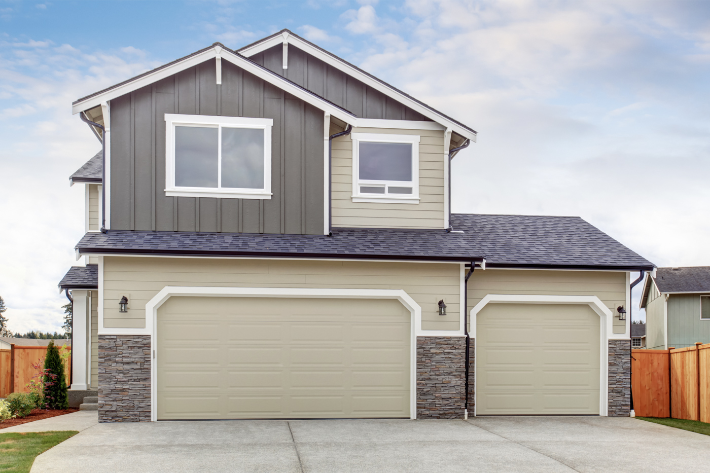 Modern home with double garage doors