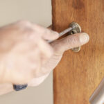 Storage locksmith repairing unit lock