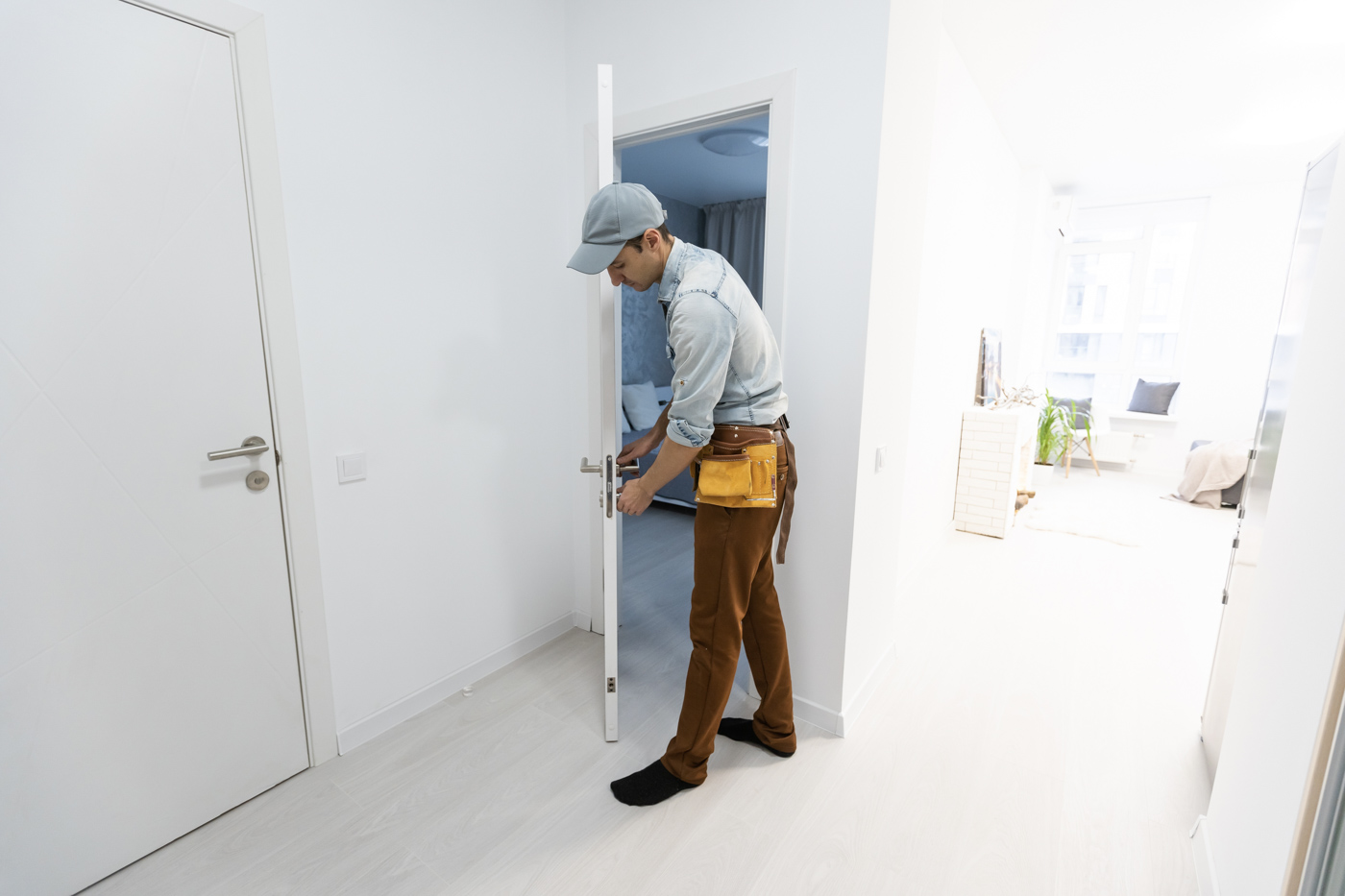 Interior door repair in bright Canadian home